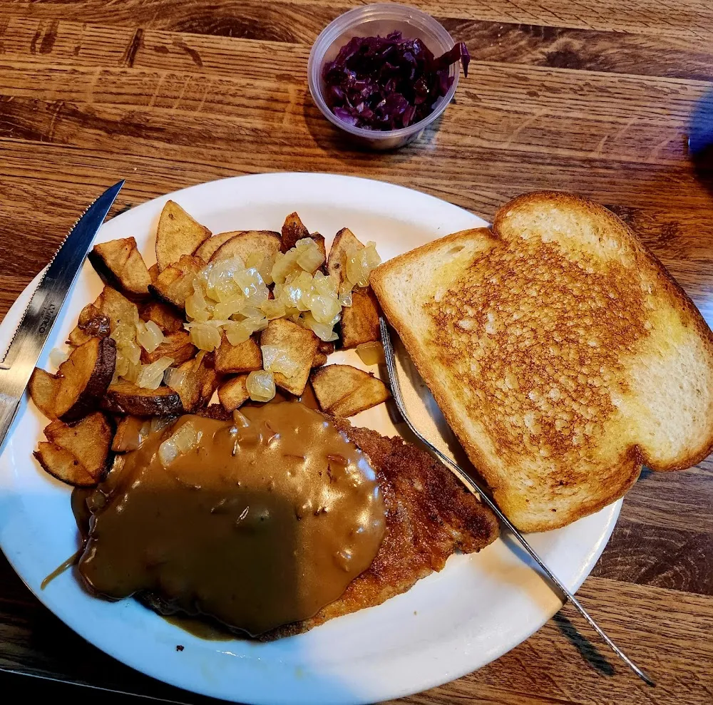 Schnitzel Platter Schnitzel Mushroom Gravy Fried Potatoes and Onions